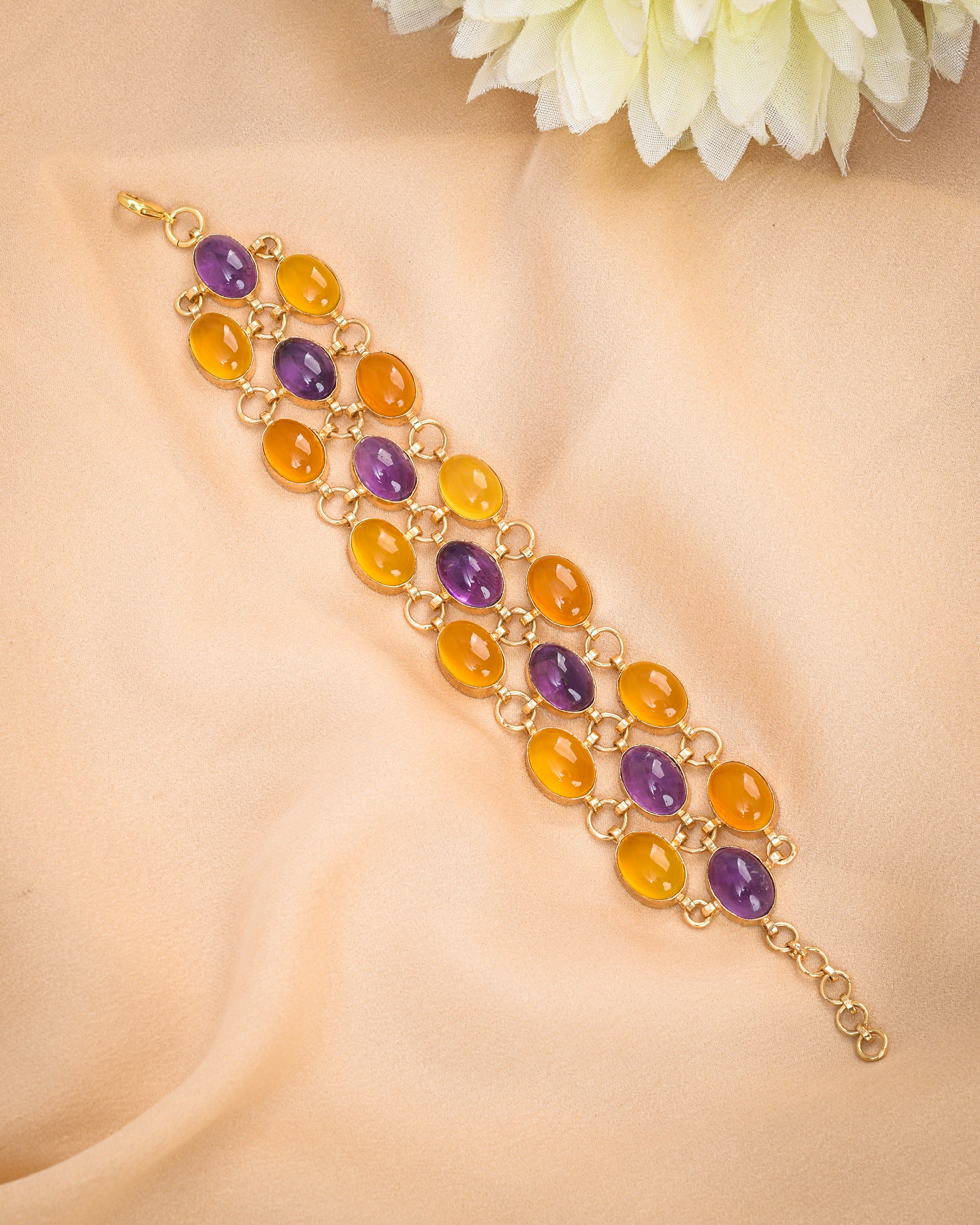 Openable bracelet in antique gold with yellow chalcedony and amethyst pear stones – traditional designer accessory
