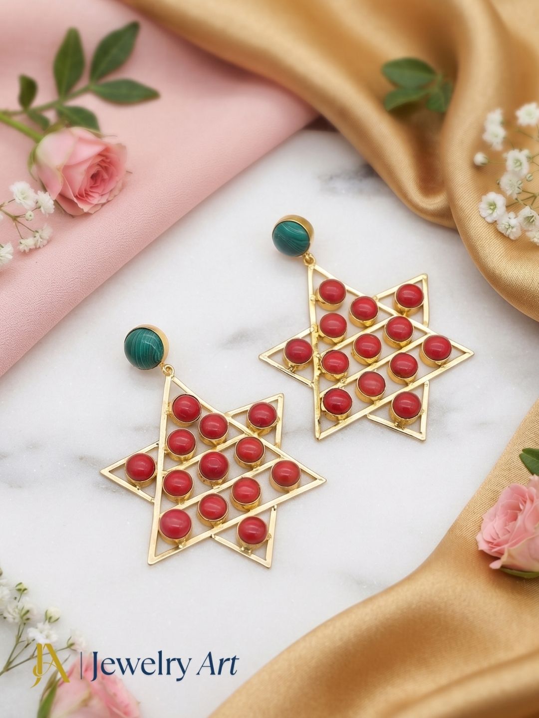 Premium Malachite Red Glass earrings in decorative product photography
