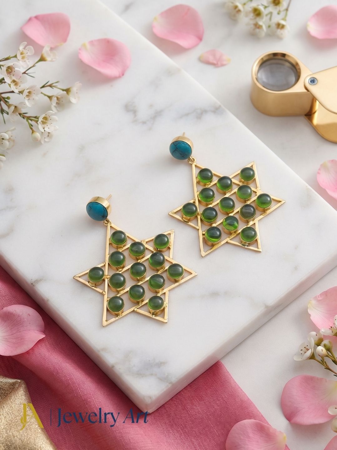 Handcrafted gold plated Turquoise and Green Onyx semi-precious gemstone dangle earrings showcased in luxury decorative jewelry styling.
