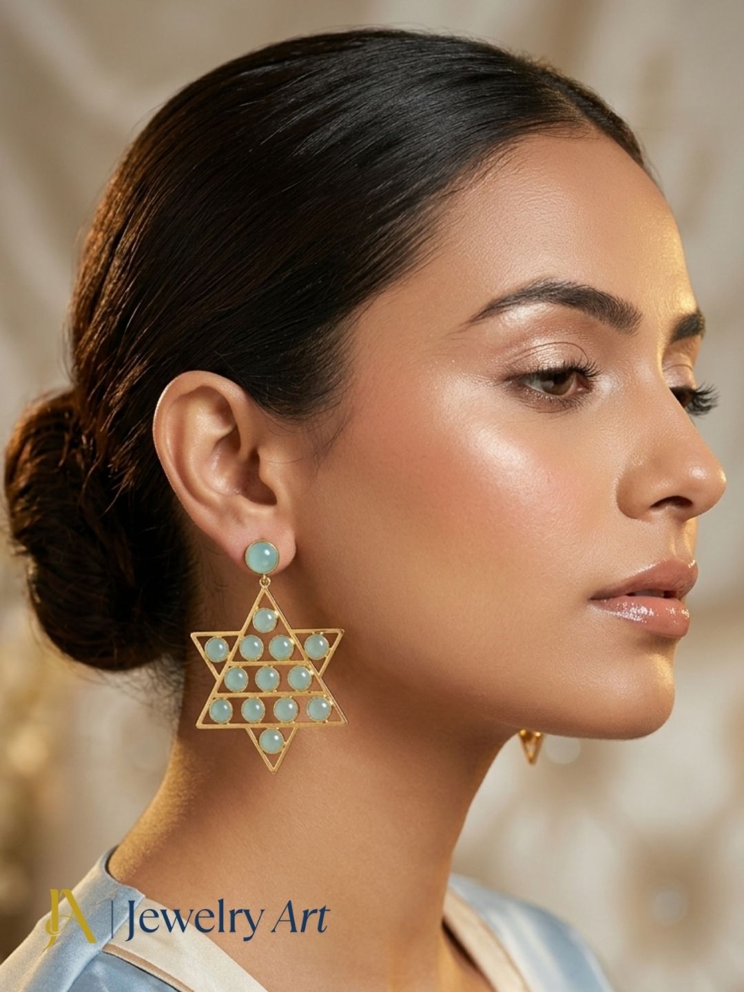 Model showcasing charming Chalcedony gemstone drop earrings
