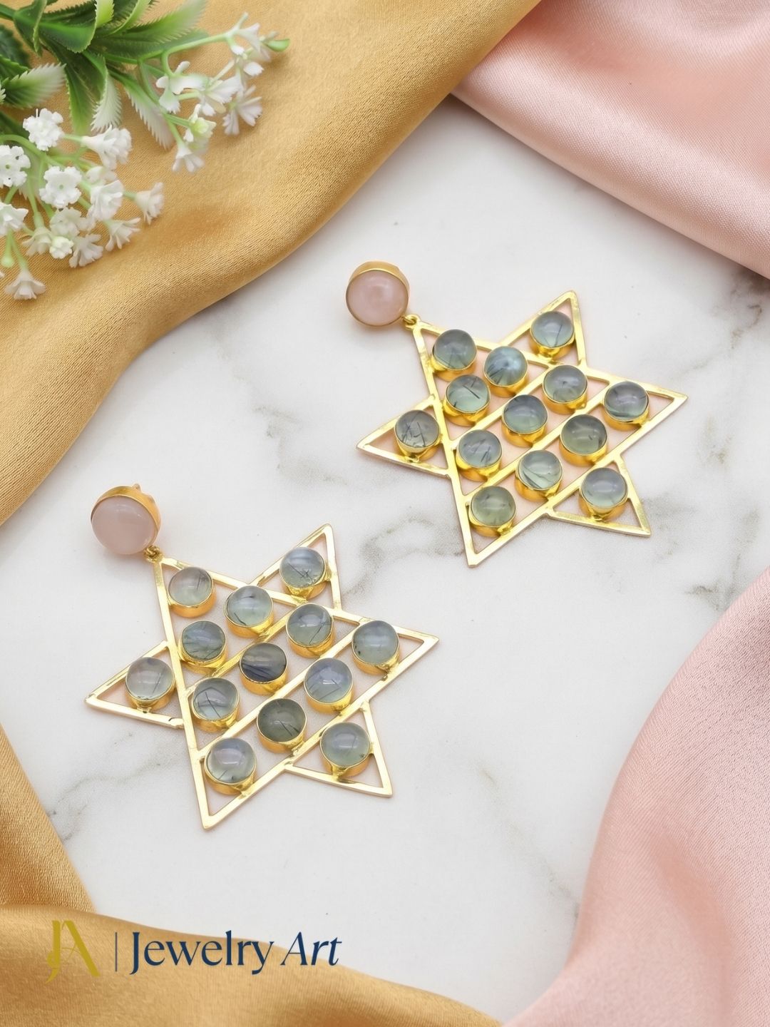 Luxury jewelry photography featuring gold plated Prehnite Rose Quartz earrings
