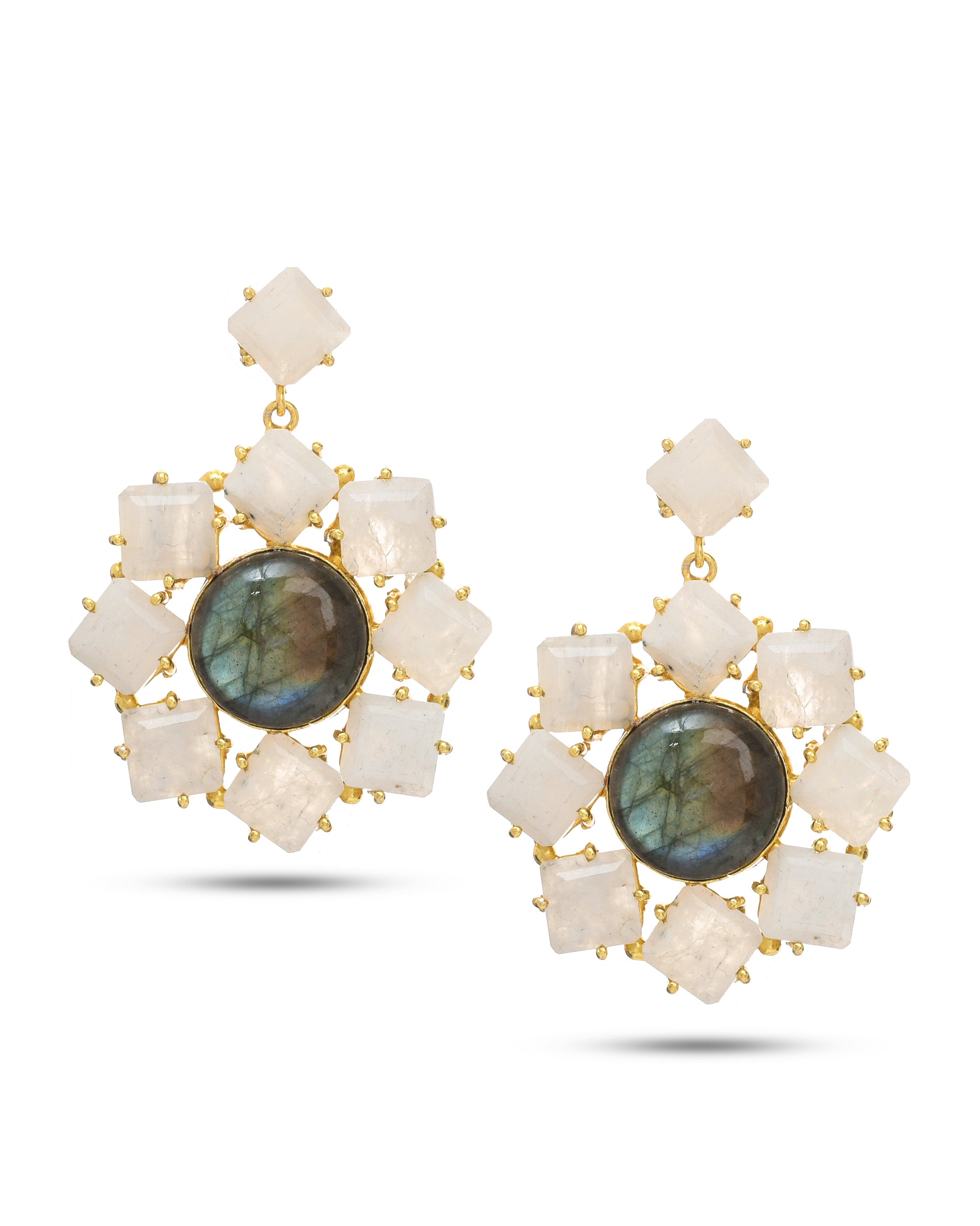 Antique gold earrings with dual-color semi-precious stones, paired with traditional ethnic attire for a festive look
