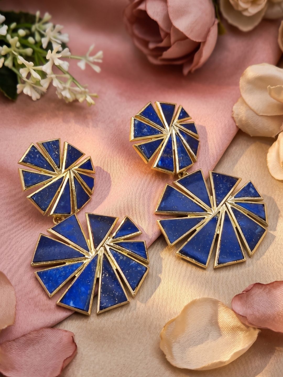 Gold plated lapis fine geometric chip stone dangle earrings showcased in luxury decorative jewelry styling.
