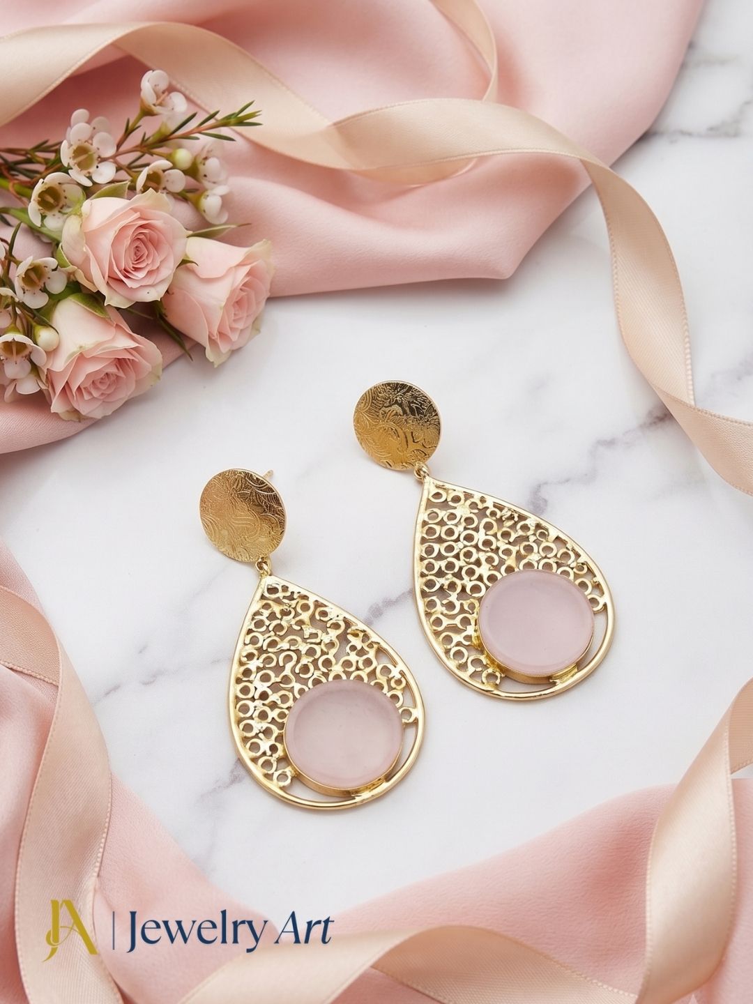 Woman styling elegant gold plated Pink Quartz gemstone earrings
