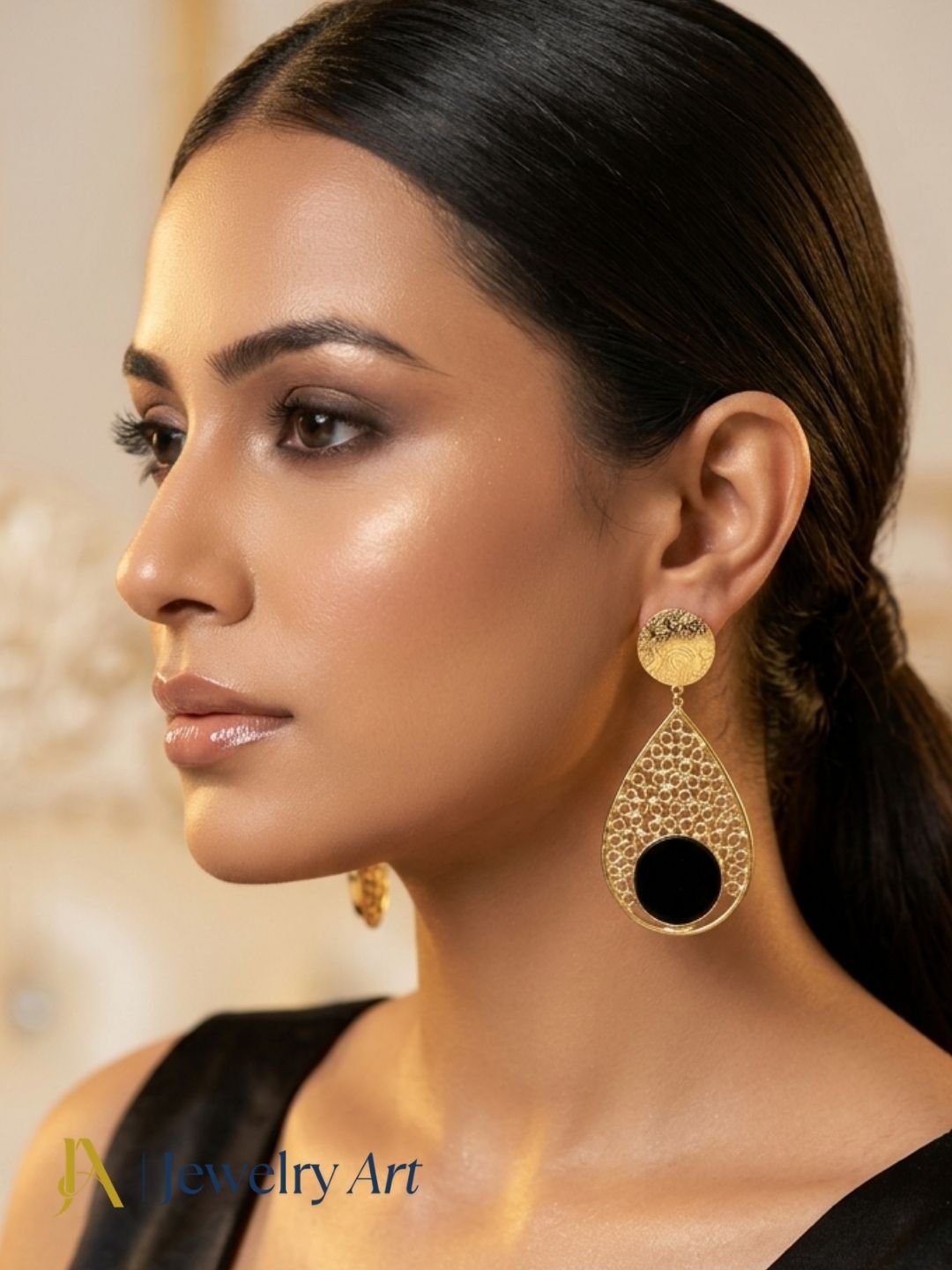 Woman wearing handcrafted gold plated Black Onyx stone lightweight designer dangle drop earrings.
