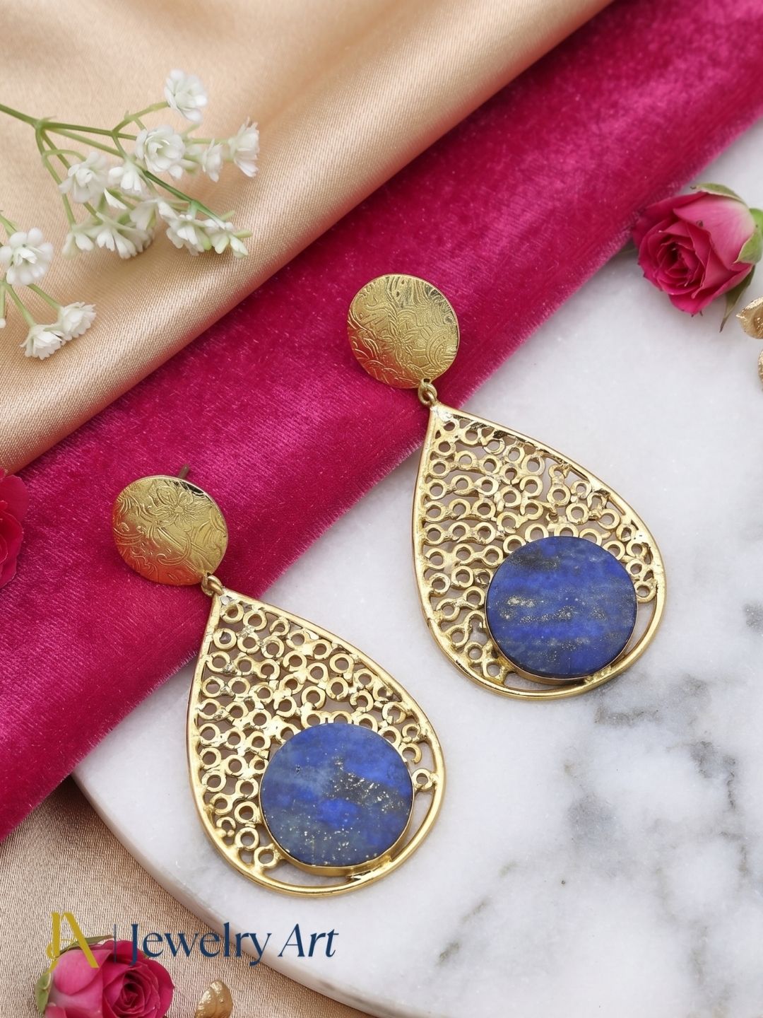 Creative arrangement of handcrafted Lapis dangle earrings
