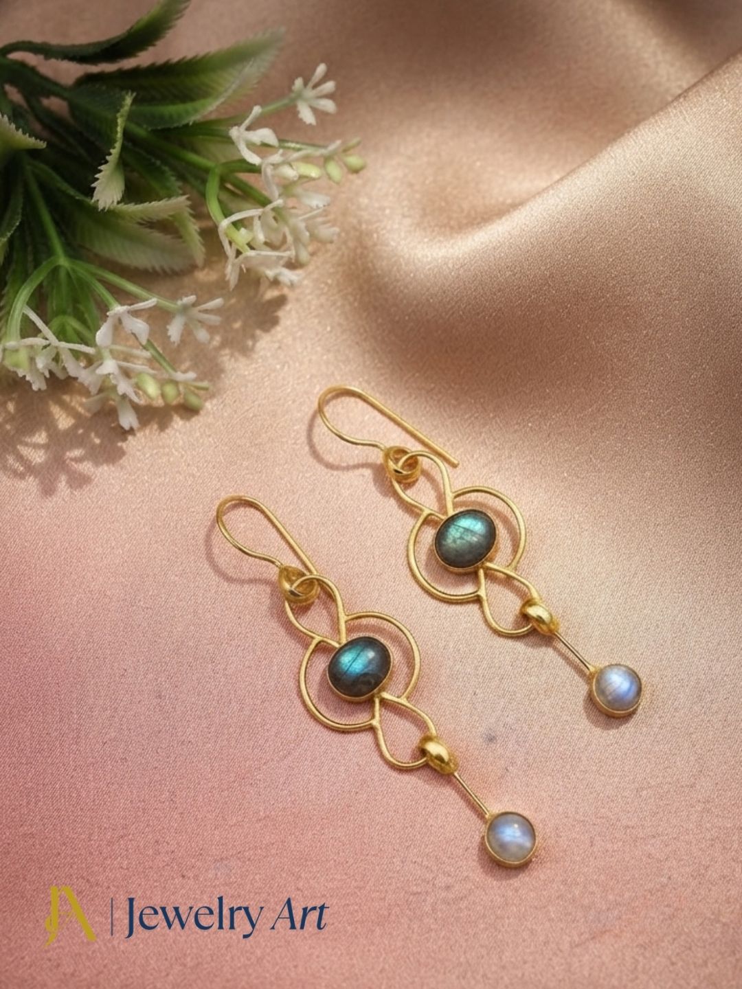 Gold plated Labradorite and White Rainbow semi-precious gemstone handcrafted earrings showcased in luxury decorative jewelry styling.
