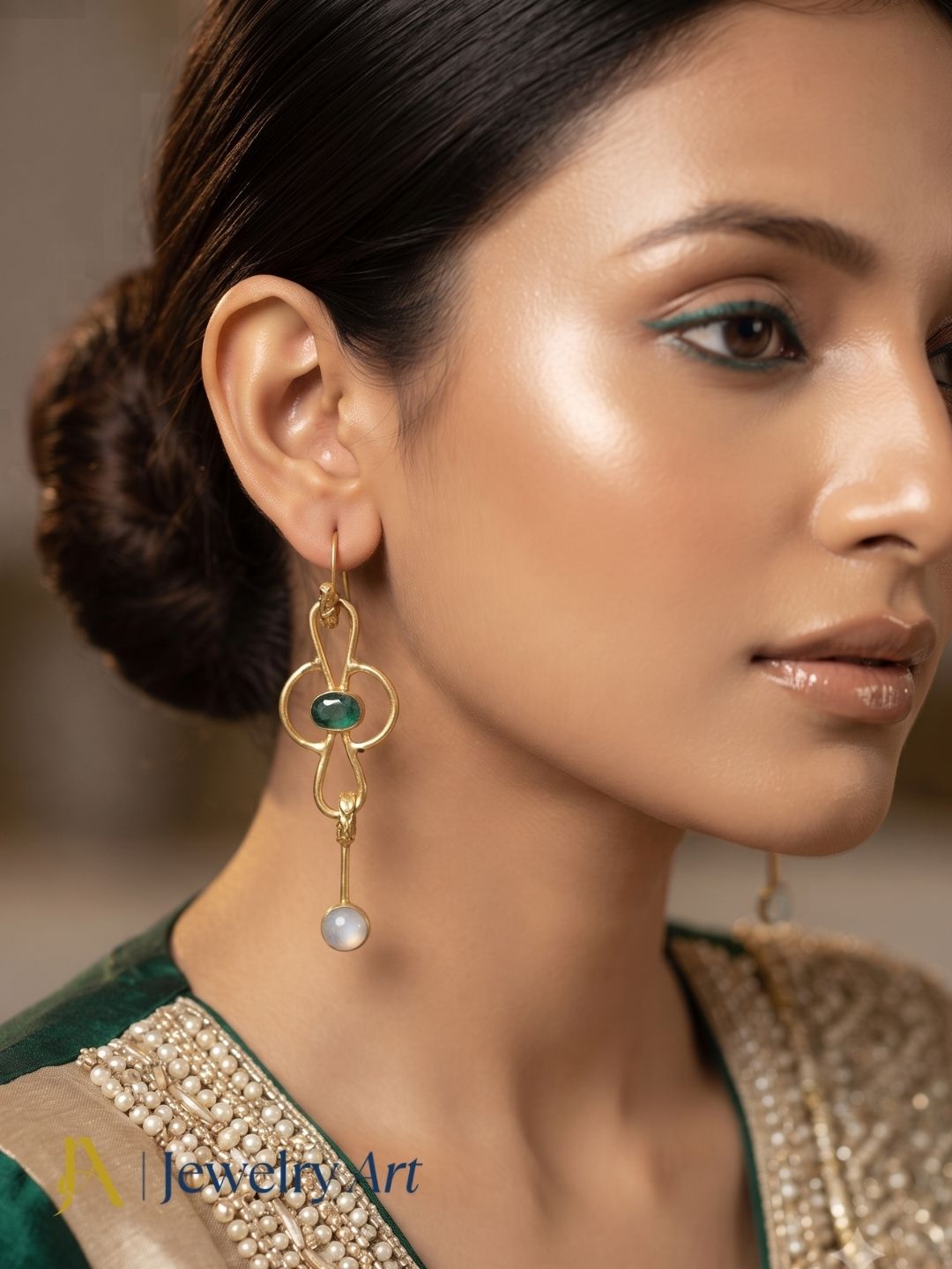 Woman styling lightweight Green Hathipara White Rainbow gemstone earrings
