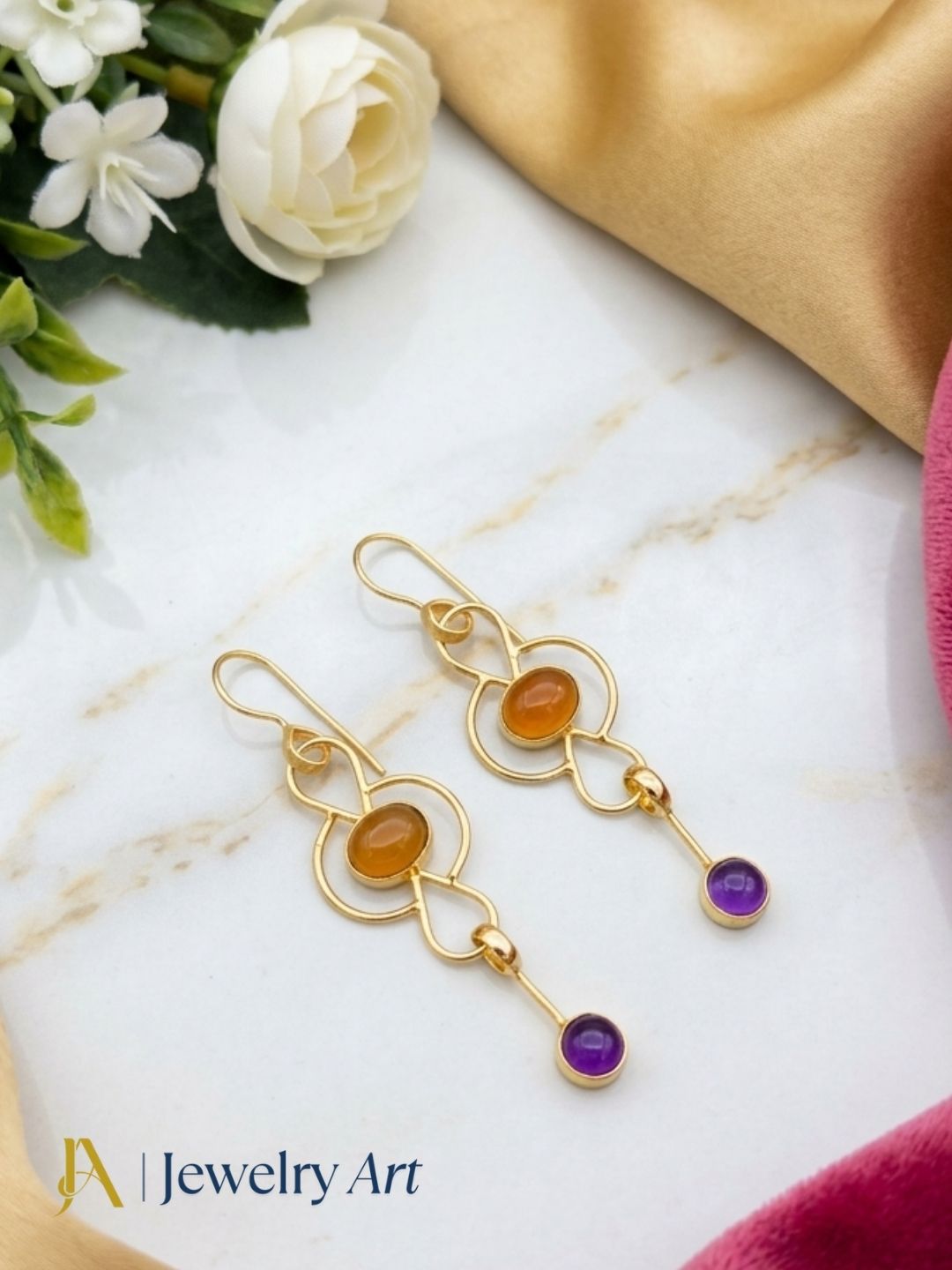 Luxury jewelry photography featuring gold plated Chalcedony Lapis earrings
