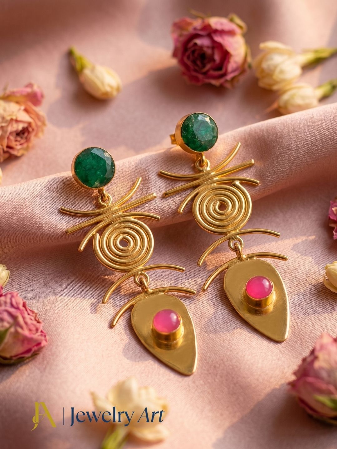 Gold plated green beryl and pink onyx earrings showcased in a luxury decorative jewelry photoshoot. 
