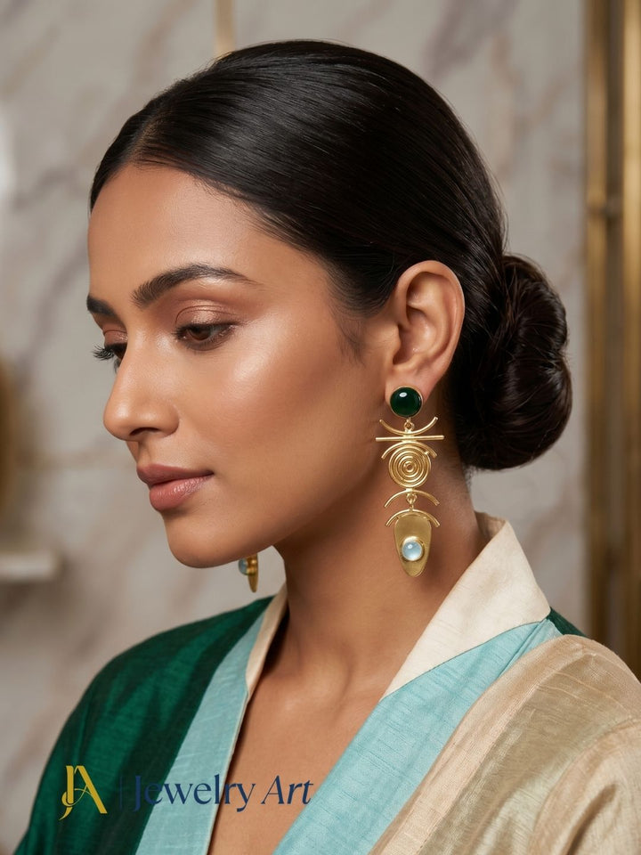 Model showcasing green onyx aquamarine gemstone earrings with elegant styling
