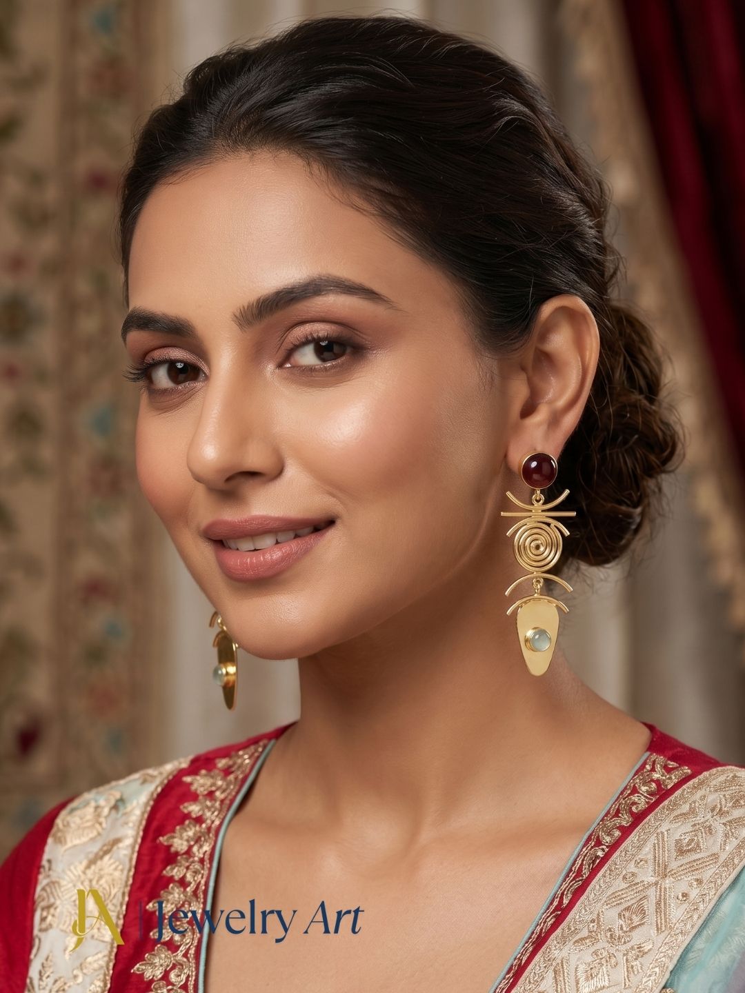 Woman styling gold plated red onyx and aquamarine earrings
