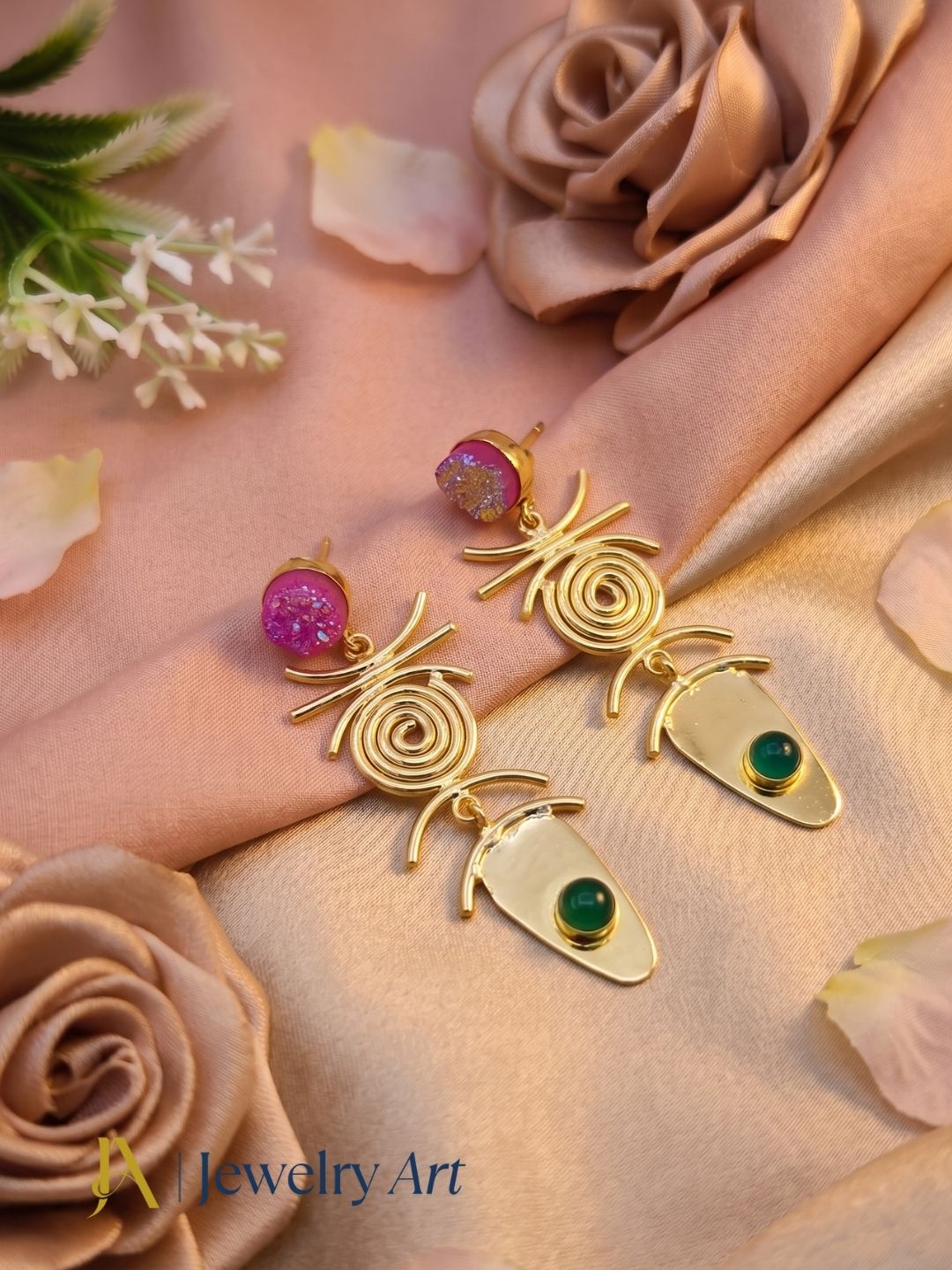 Creative jewelry photography featuring pink druzy and green onyx gemstones
