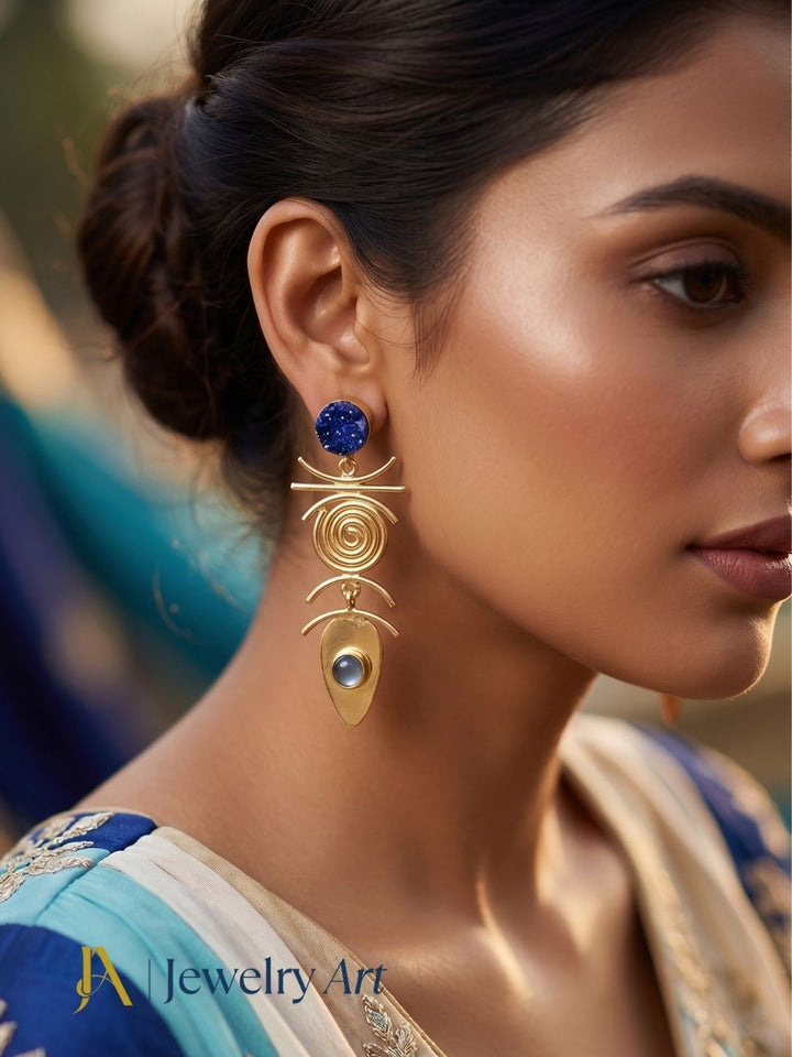 Fashion model wearing designer blue druzy and aquamarine drop earrings
