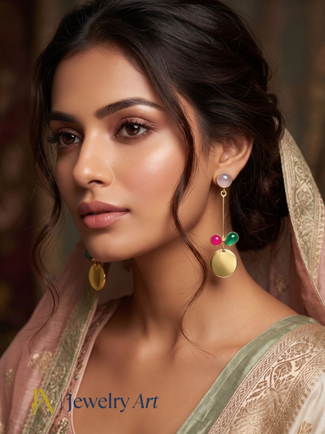 Model wearing handcrafted designer earrings with rose quartz and onyx stones
