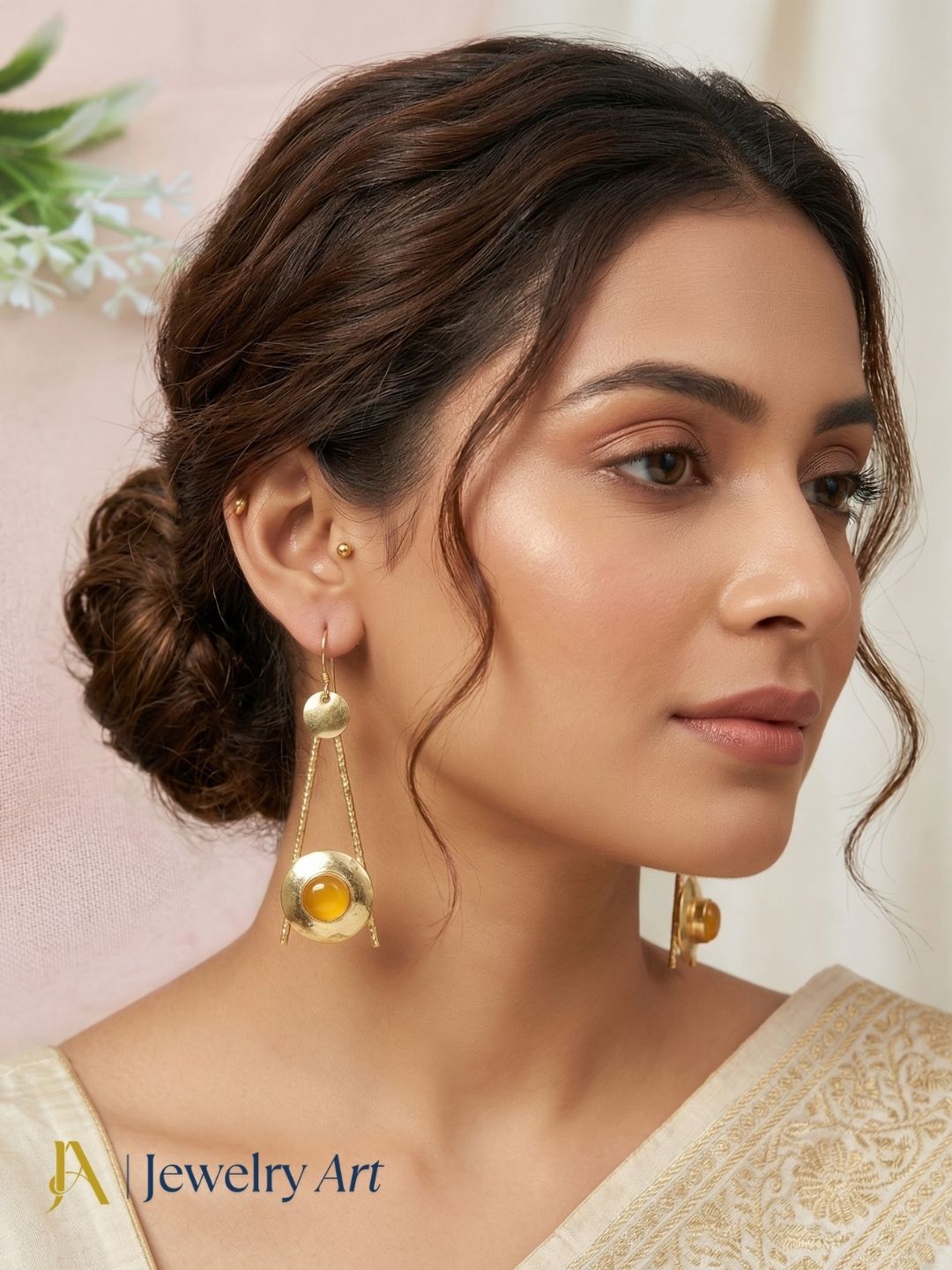 Stylish statement earrings with yellow chalcedony stone and smooth glossy texture
