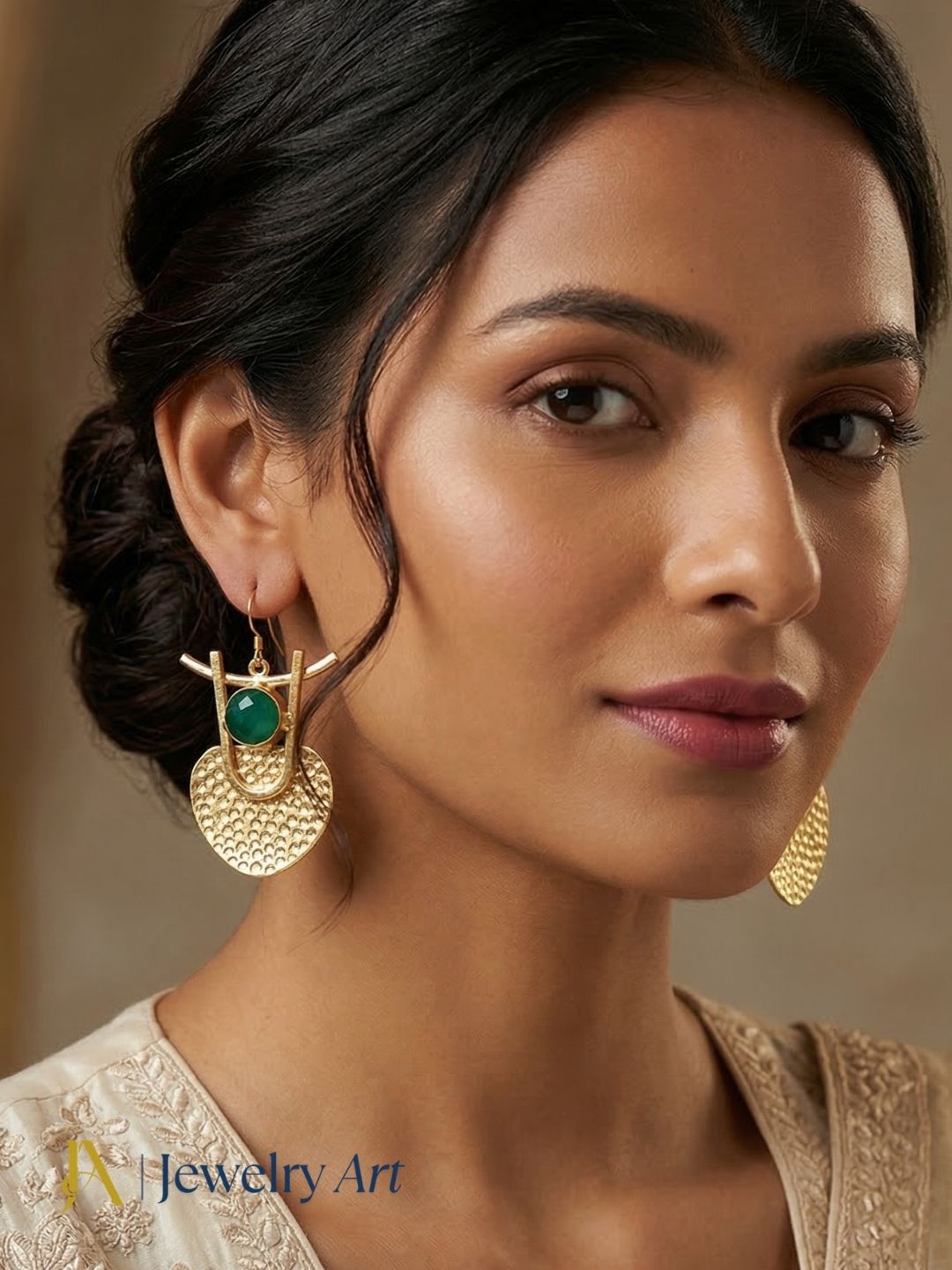 Modern gold tone earrings with green hathipara stone faceted design

