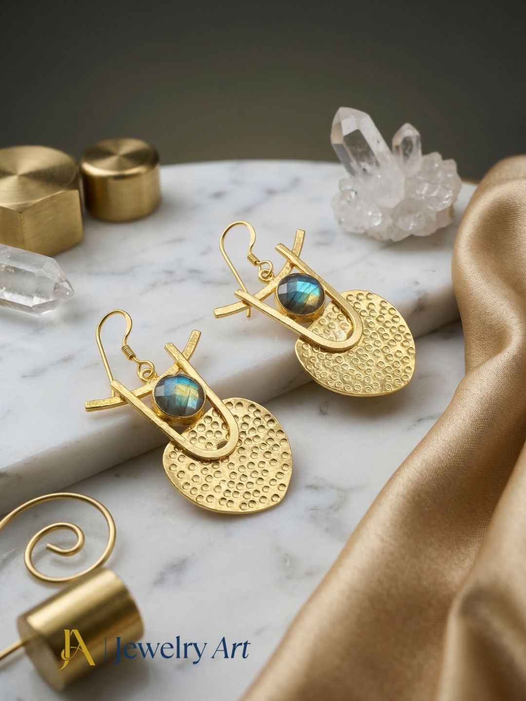 Bold statement earrings with faceted labradorite and gold tone detailing
