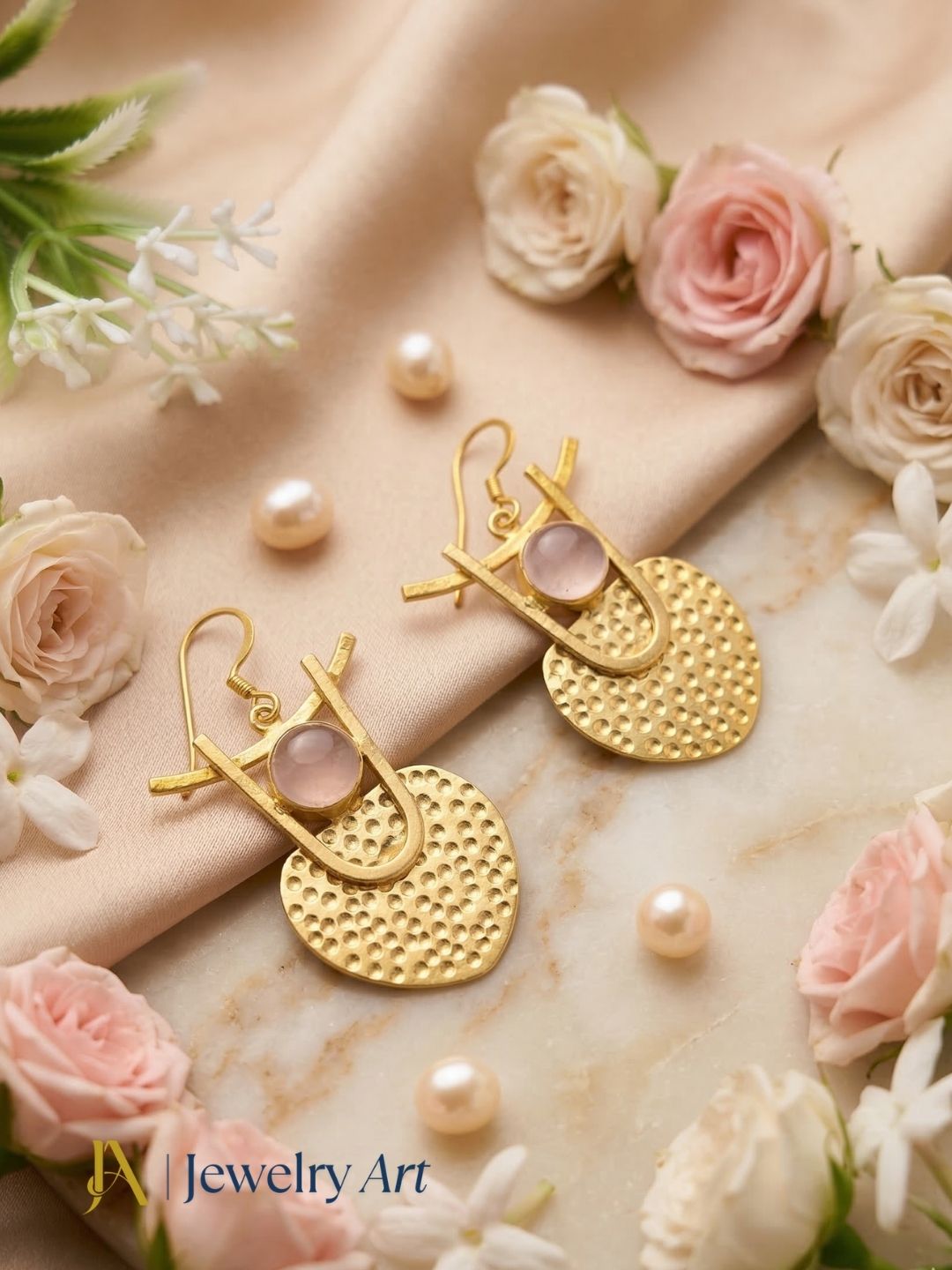 Unique gold plated earrings with rose quartz stone featuring natural pink charm
