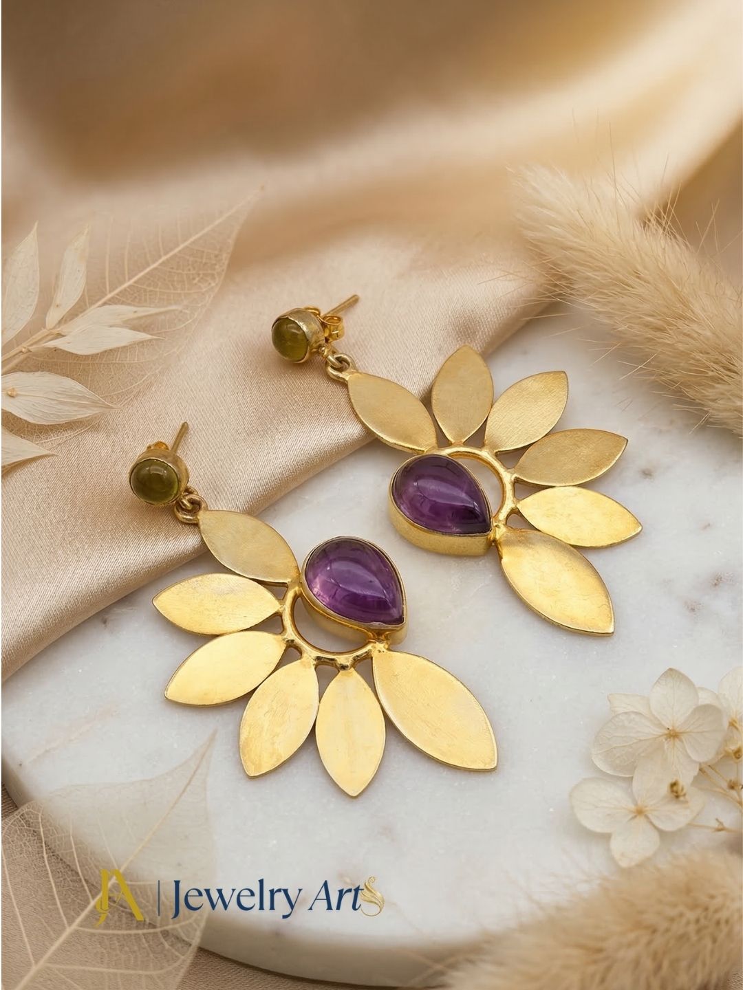 Elegant gold plated leaf drop earrings 
