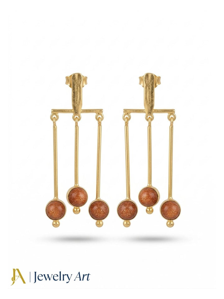 Designer gold plated earrings with  sun sitara accents and glossy light reflection
