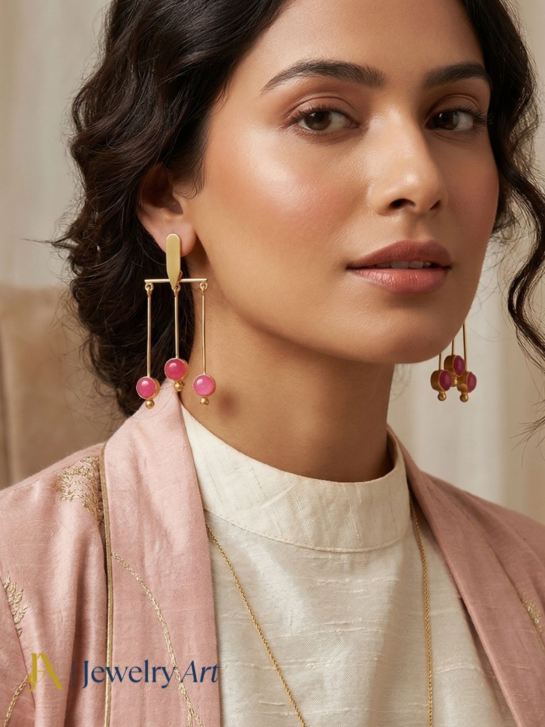 Luxury designer earrings with soft pink stone gold plating
