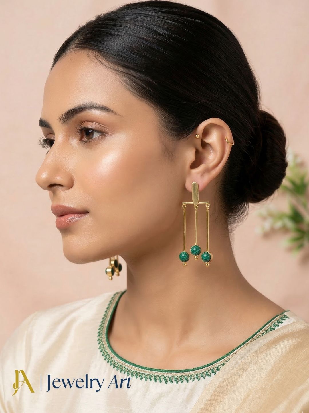 Elegant gold plated dangle earrings featuring synthetic malachite stone designer hanging earrings.
