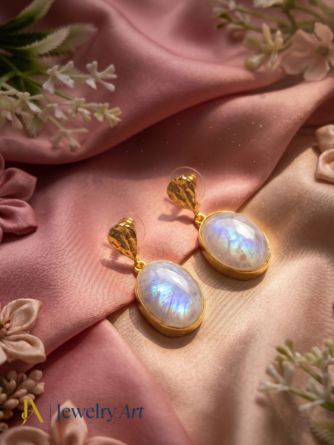 Artistic display of handcrafted white rainbow stone earrings for women
