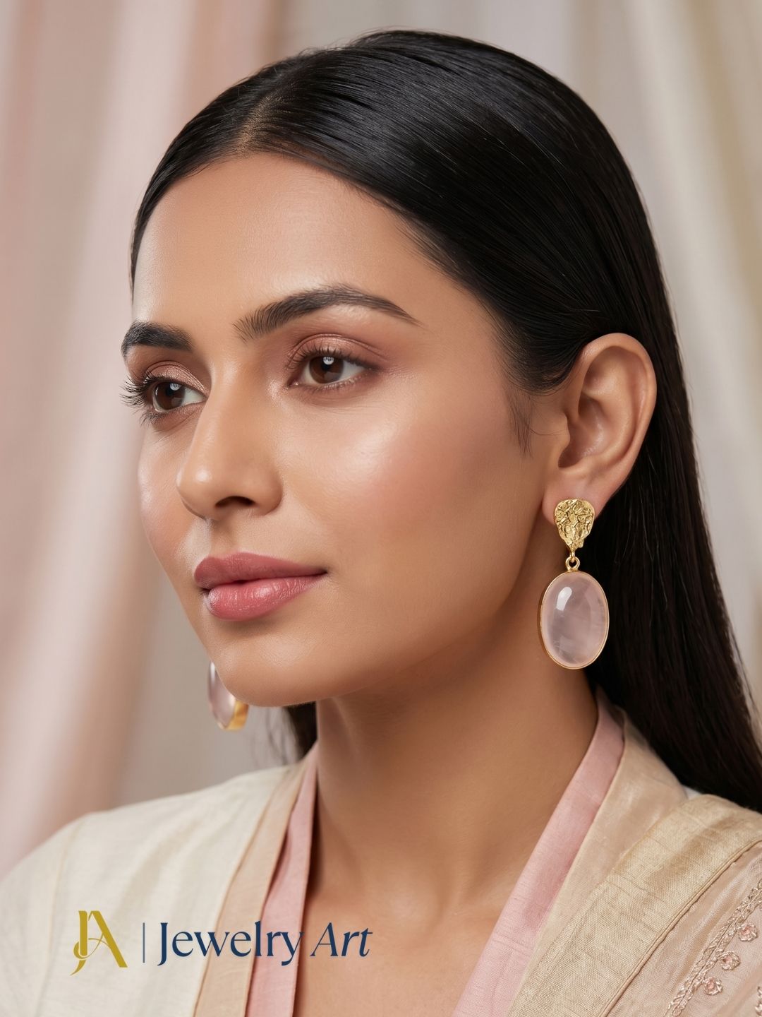 Woman showcasing gold plated rose quartz party wear earrings
