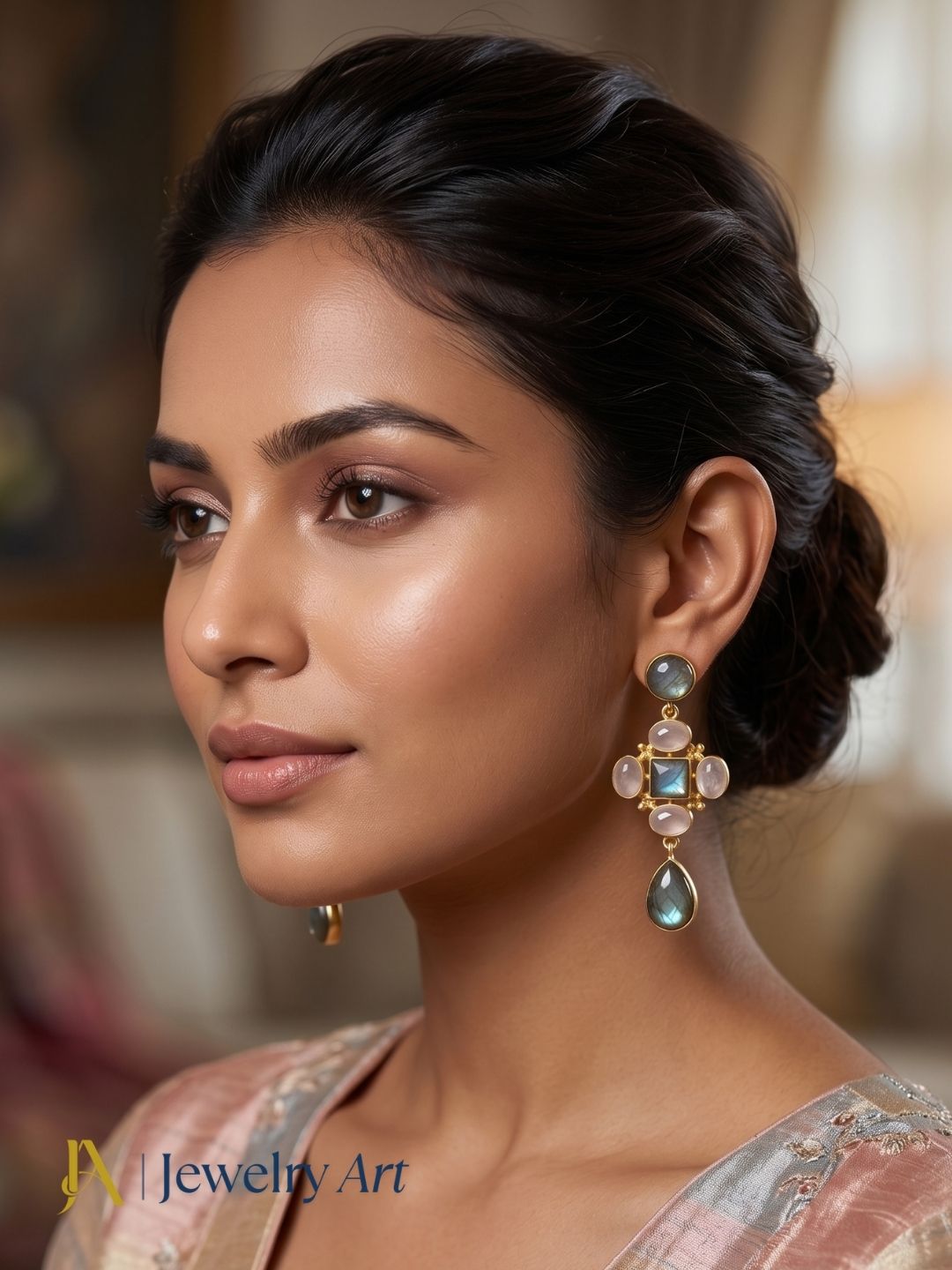Woman wearing designer gold plated labradorite and prehnite gemstone earrings.
