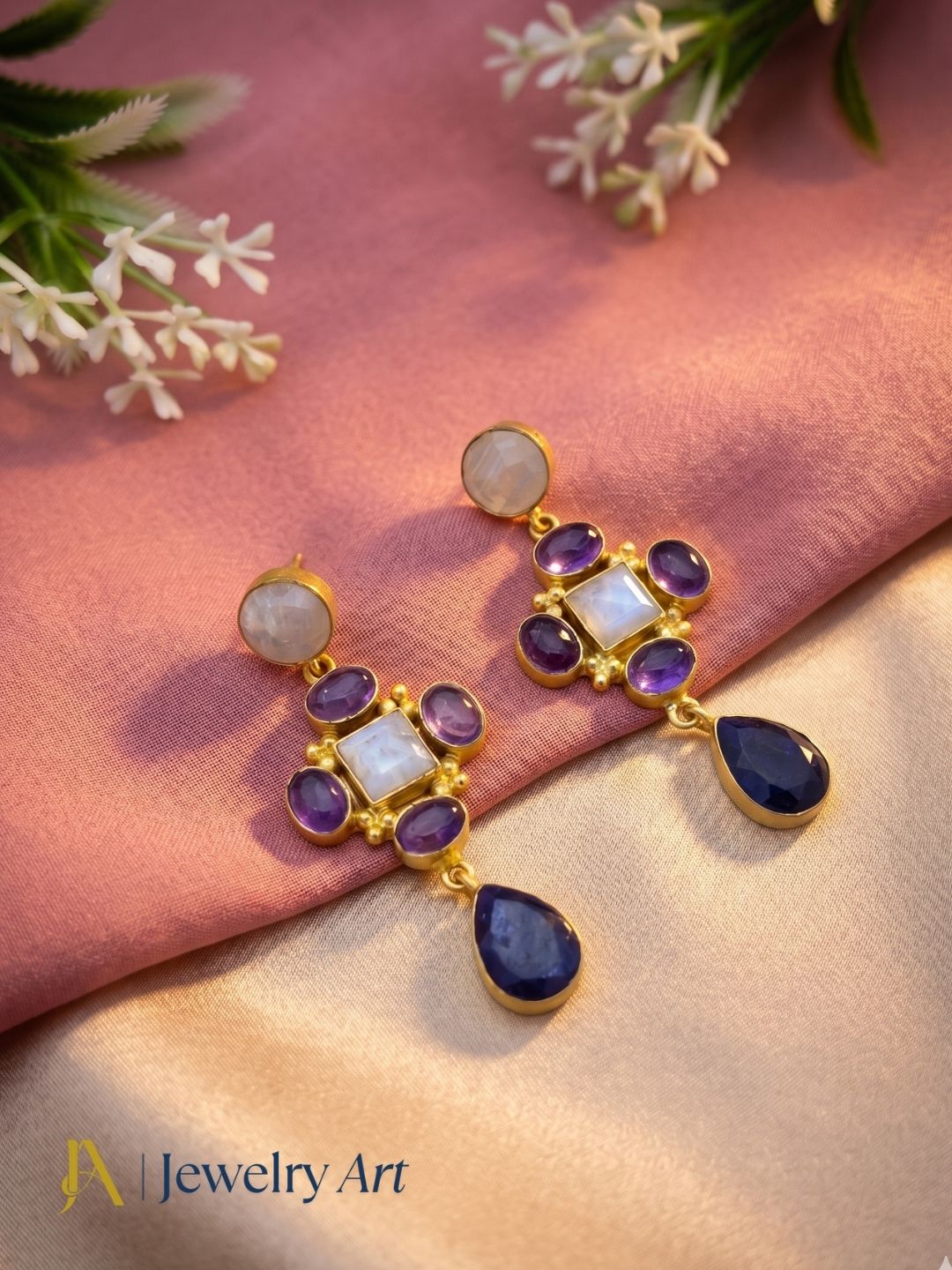 Creative arrangement of handcrafted multi gemstone dangle earrings
