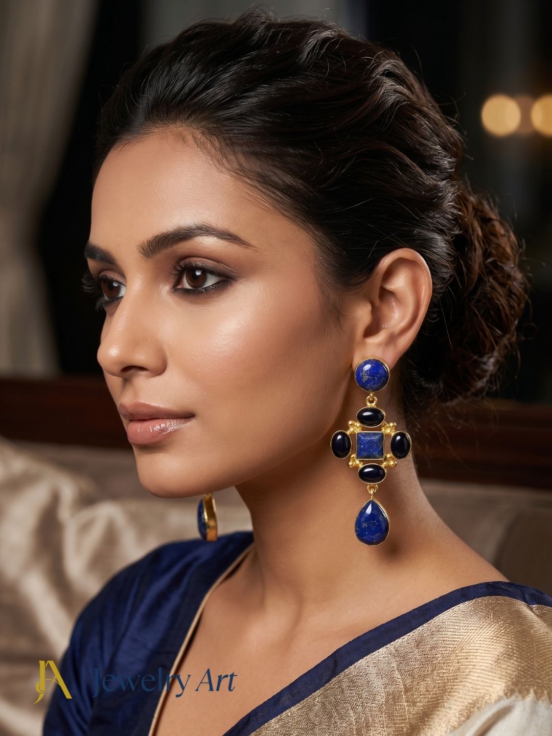 Model wearing lightweight gemstone earrings with lapis and black onyx accents
