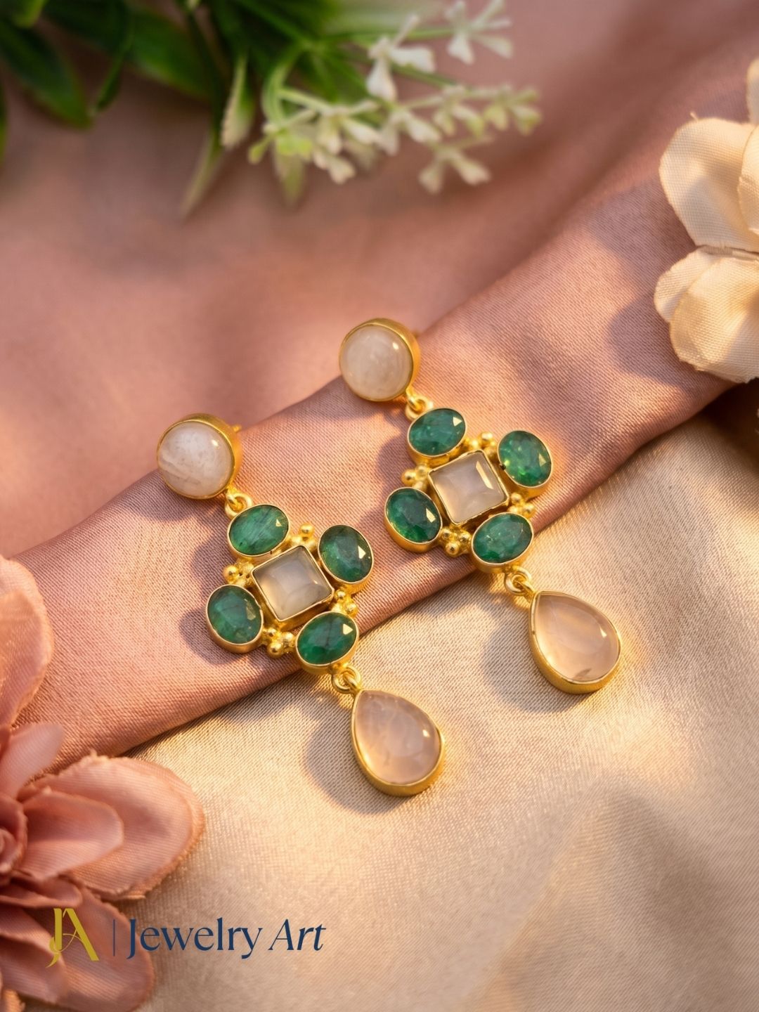 Luxury gemstone earrings featured in decorative product photography
