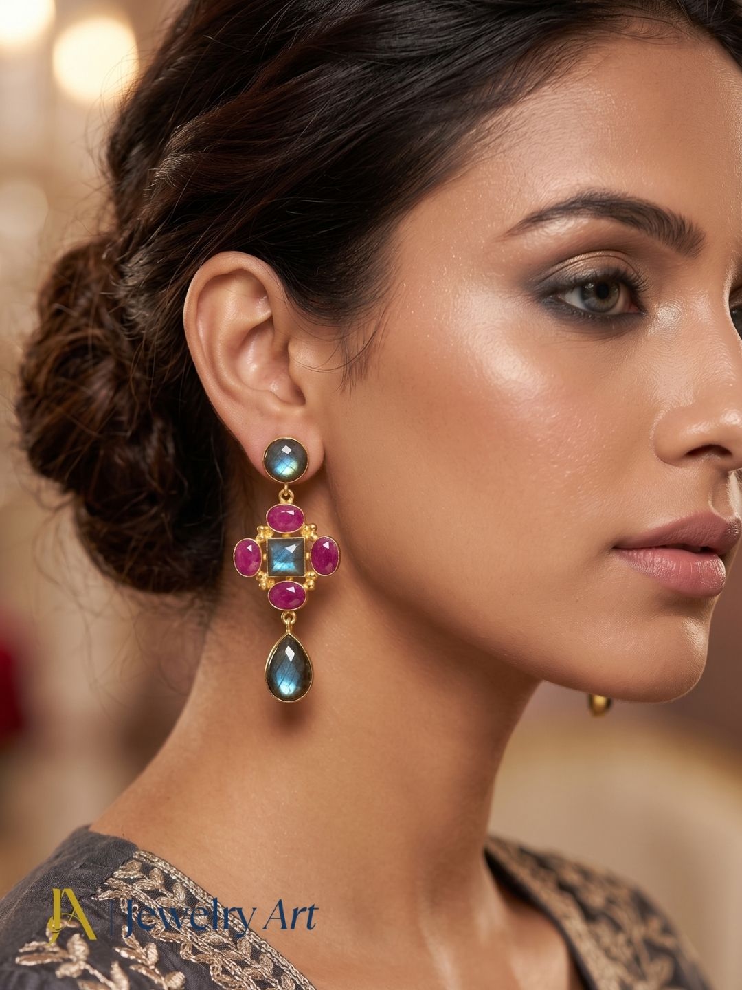Fashion model showcasing handcrafted labradorite red Hathipara earrings
