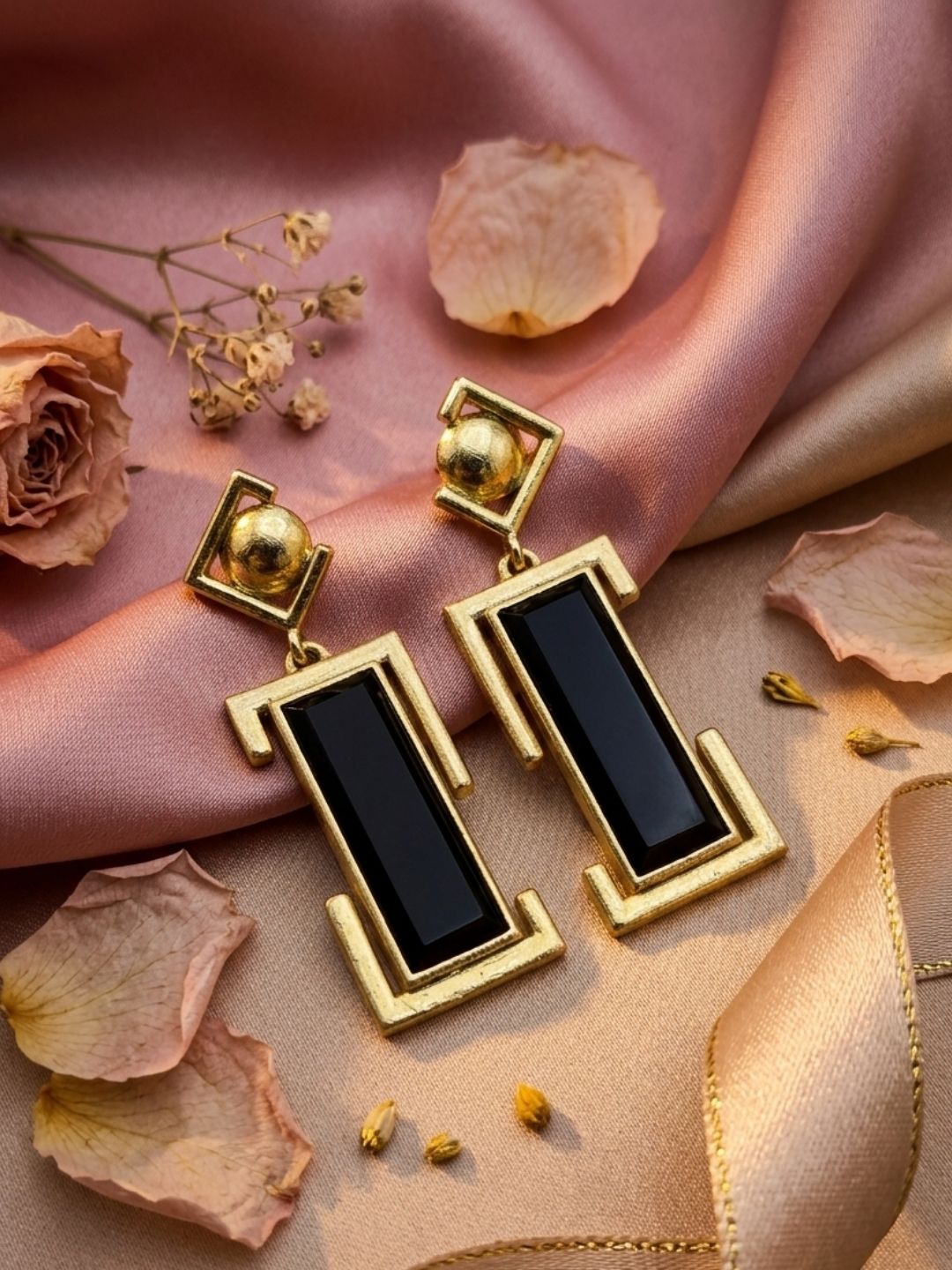 Gold plated black onyx geometric drop earrings in decorative styling with handcrafted designer appeal

