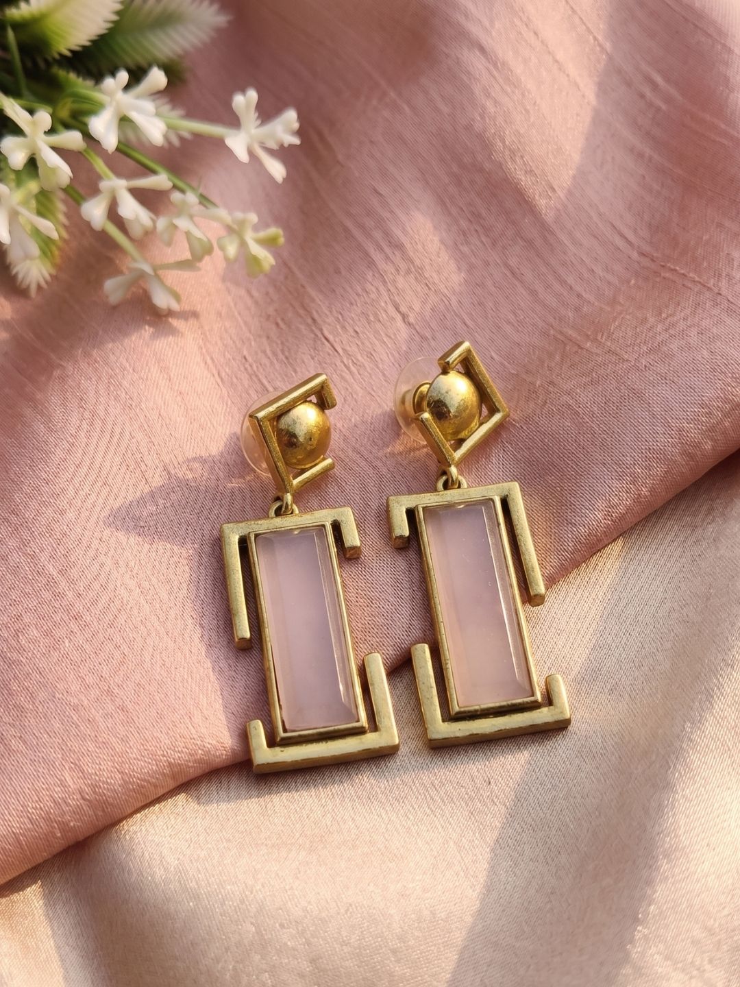 Gold plated rose quartz geometric drop earrings in decorative styling with handcrafted designer appeal
