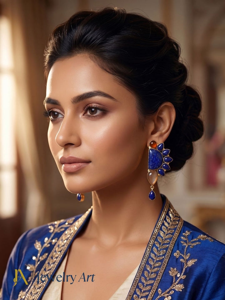 Fashion drop earrings featuring colorful gemstones and gold plated finish
