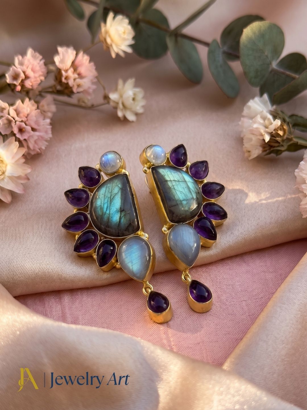 Woman wearing premium handcrafted labradorite amethyst monalisa multi gemstone drop earrings at party
