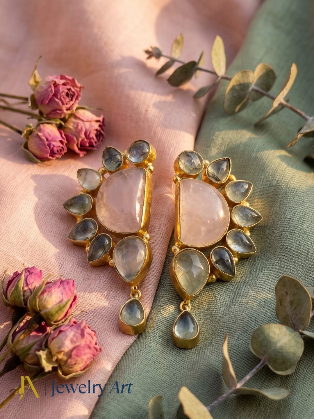 Woman wearing handmade rose quartz prehnite gold plated dangle drop earrings — front view showing full earring drop and blush pink green gemstone detail
