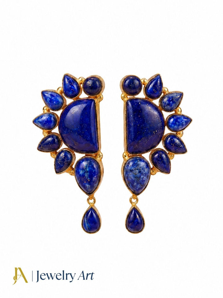 Gold plated lapis multi stone designer party earrings lapis lazuli stone and blue crystals on styled surface
