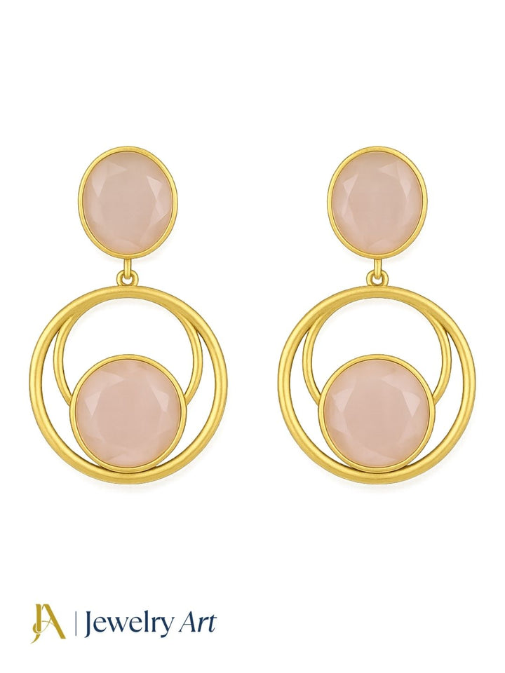 Gold plated Rose Quartz semi-precious gemstone lightweight dangle earrings isolated on pure white background.

