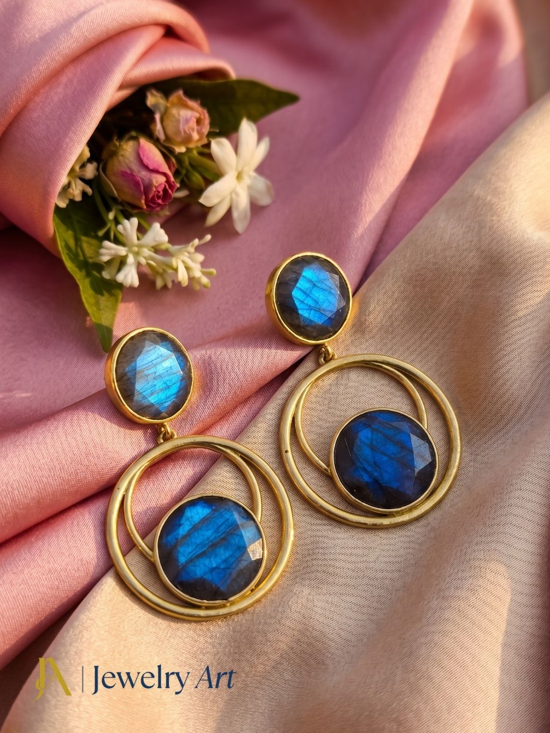 Elegant Labradorite earrings arranged in a premium jewelry display
