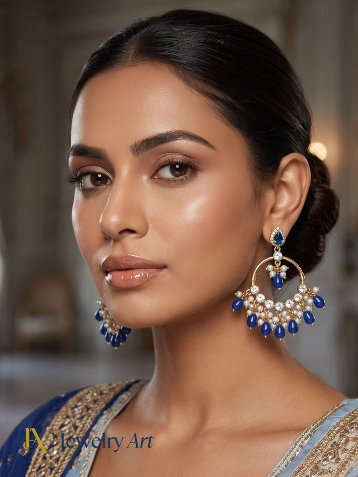 Model showcasing designer AD Moissanite earrings with blue jade beads
