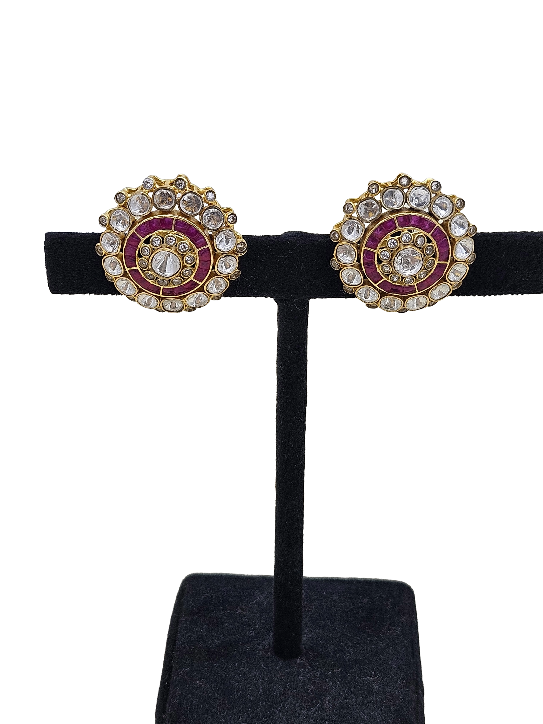 Handcrafted AD polki red stone studs displayed on earring mannequin stand – everyday women’s jewellery
