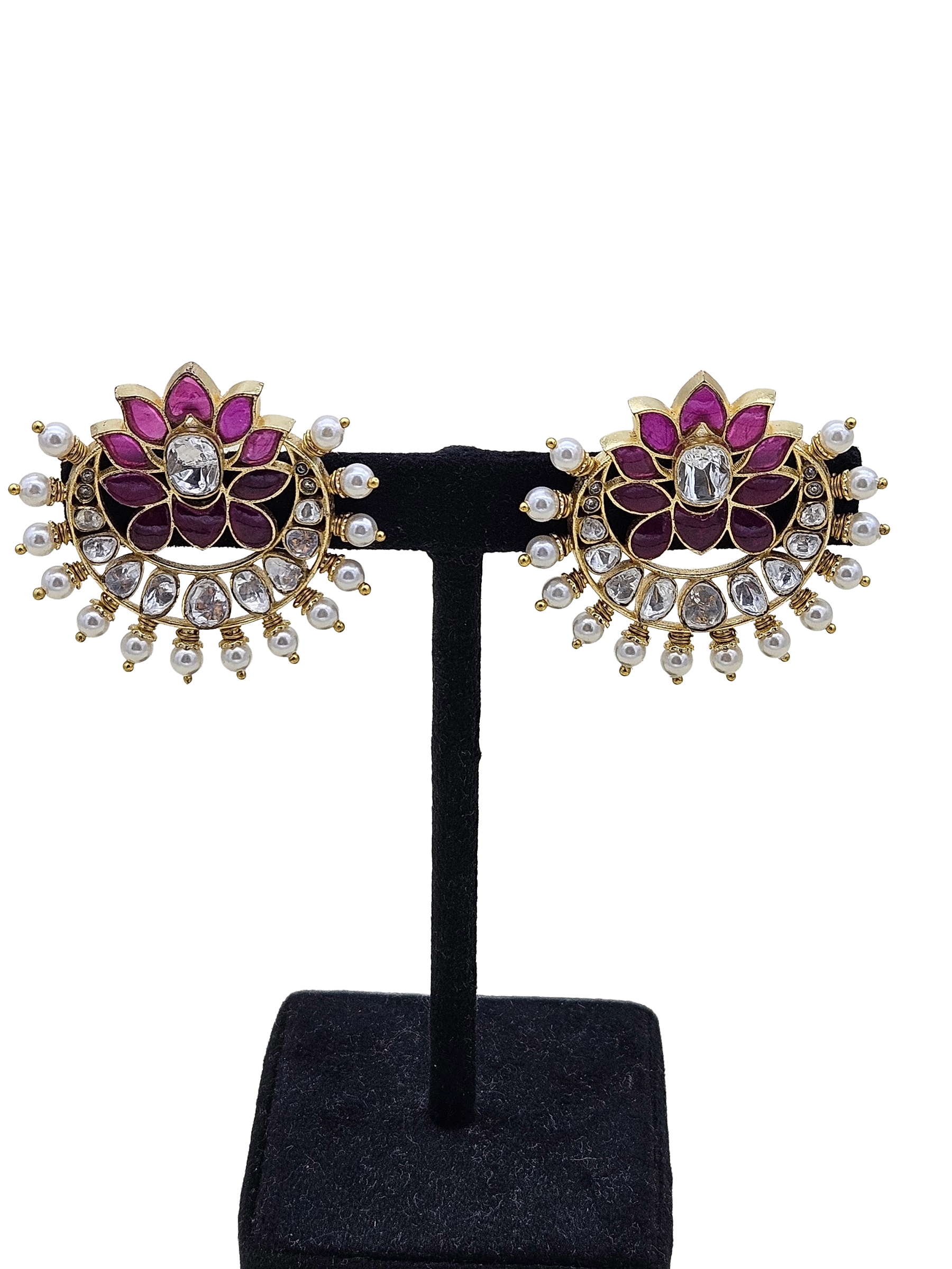 Designer AD moissanite polki red stone pearl costume stud earrings showcased on earring display stand
