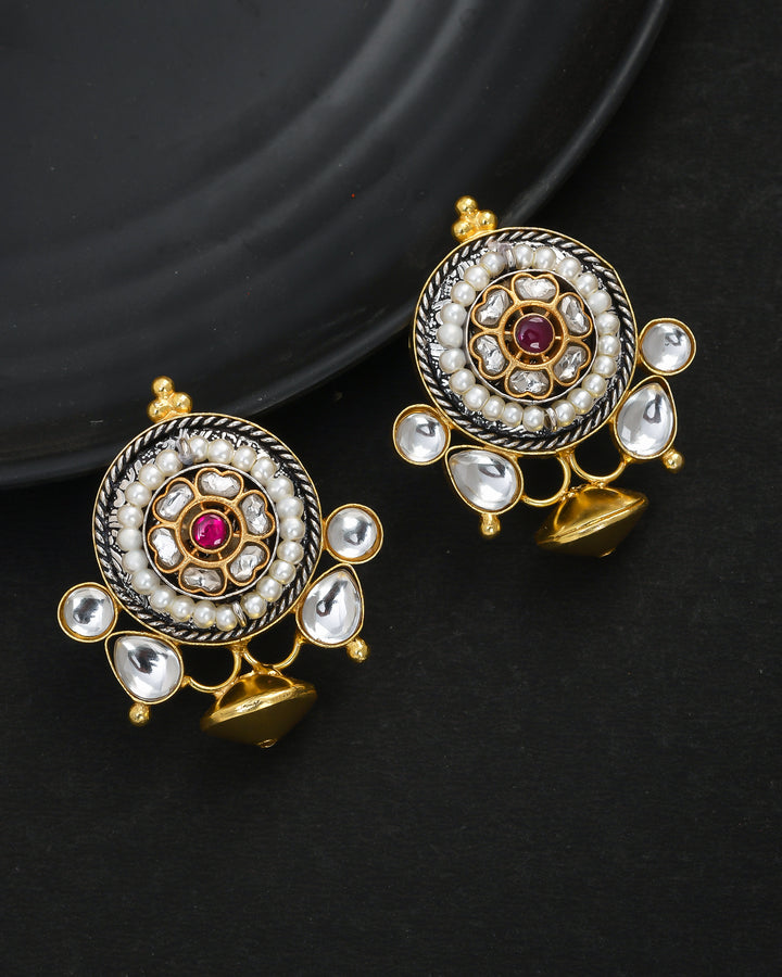 Amazing antique gold stud earrings with Kundan Polki and pearl detailing – elegant traditional designer jewelry
