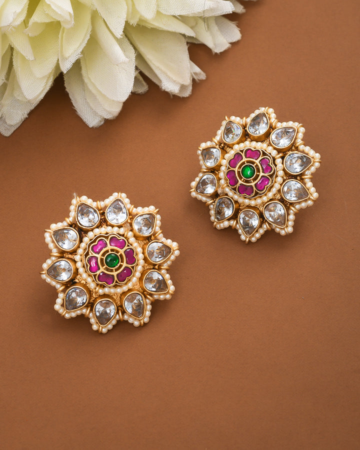 Antique gold Kundan Polky stud earrings with pearl drops and floral designer style – perfect for traditional looks

