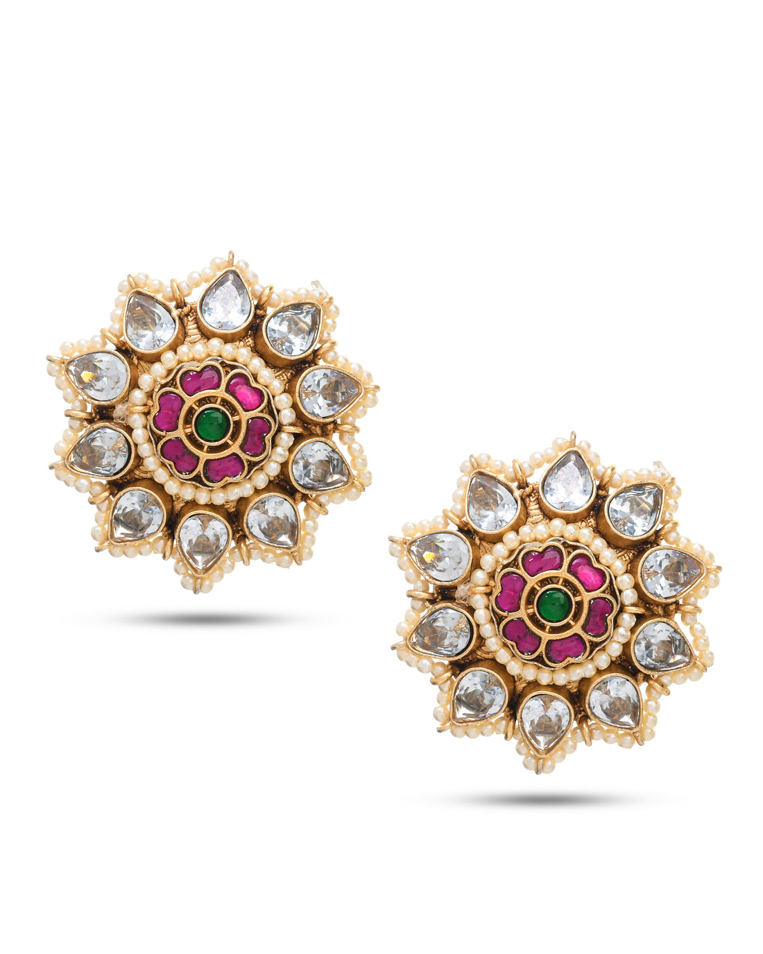 Floral style antique gold Kundan Polki studs with pearl drops styled for traditional wear

