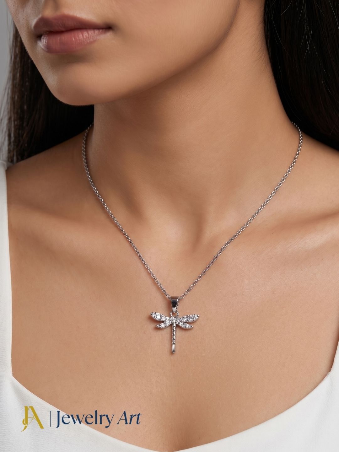 elegant white rhodium fly motif necklace with cubic zirconia detailing
