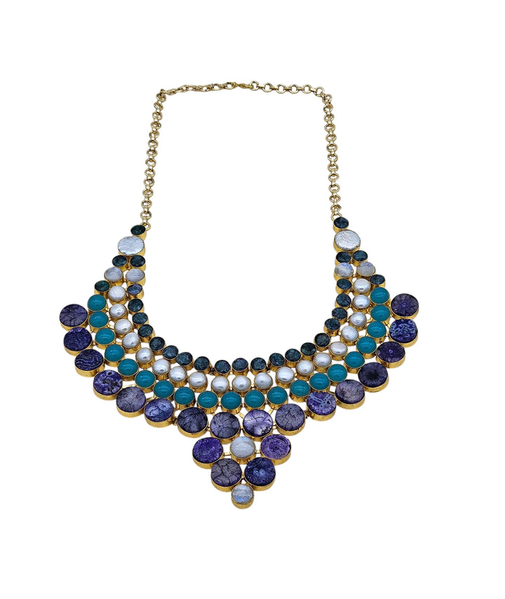 Handcrafted broad necklace with antique gold polish, Hathipara details, and embellishments in chalcedony and solar quartz
